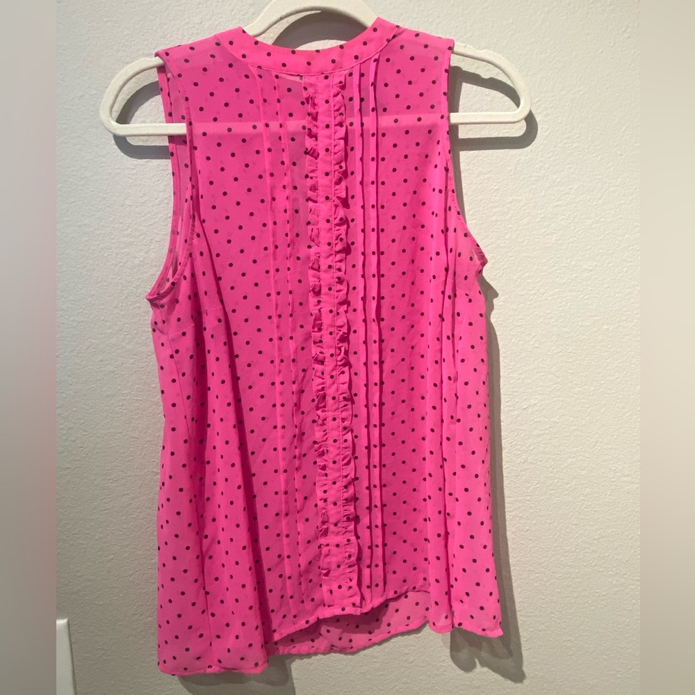 Worn only a few times. Sheer, bright pink, sleeveless. Very lightweight.
